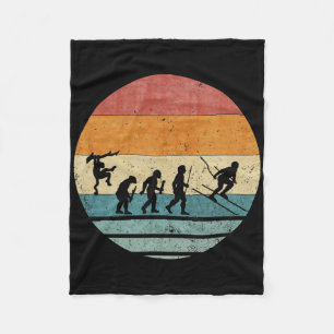 Vintage Retro Evolution Of Skiing Player Skier Sil Fleece Blanket