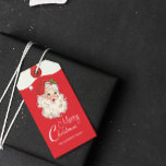 Vintage Retro Jolly Santa Claus Christmas Gift Tags<br><div class="desc">🎅 Step into the enchanting world of "Winter Days"! Presenting our Vintage Retro Jolly Santa Claus Christmas Gift Tags – the ultimate festive touch for Santa fans! 🌟 Customise with your family name for that personal ho-ho-touch. In classic red,  these tags are the perfect finishing ho-ho-ho! 🎁✨</div>