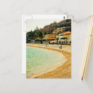 Vintage sandy seashore city sea houses and trees postcard