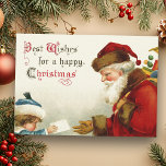 Vintage Santa and Child with Christmas Letter Holiday Card<br><div class="desc">Nostalgic image of Victorian era red-robed Santa Claus carrying bag of toys receiving a letter from a shy child in blue coat and hat.  Complementary image on reverse with customisable text.</div>