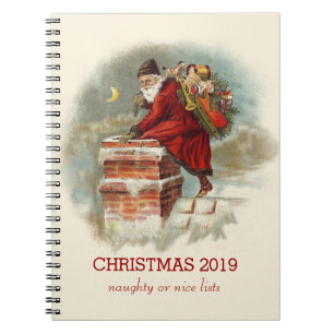 Vintage Santa Claus climbing into a chimney Notebook
