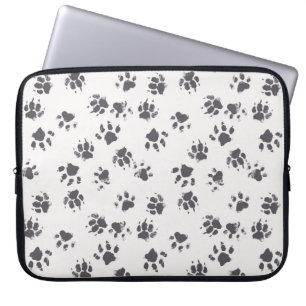 vintage seamless pattern with paw footprints of a laptop sleeve