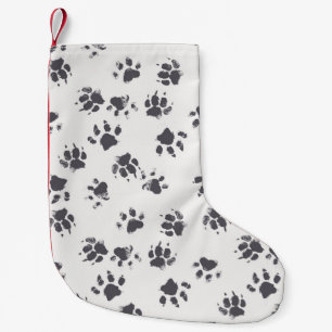 vintage seamless pattern with paw footprints of a small christmas stocking