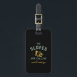 Vintage Skiing Quote Slopes Are Calling I Must Go Luggage Tag<br><div class="desc">The Slopes Are Calling and I Must Go. Funny winter sports design for skier. Cool vintage and retro merchandise to wear as you ride your skis down the snow-covered slope and show your stunts. Perfect for extreme sports athlete and those going on a winter vacation up the snow mountain. Great...</div>