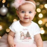 Vintage Snowman Girl Pink First Christmas T-shirt<br><div class="desc">Cute First Christmas or 1st Christmas Birthday baby t-shirt with an adorable snowman and Christmas tree in blush pink with vintage vibes. Easily personalise the text. :) - Kate Eden Art</div>