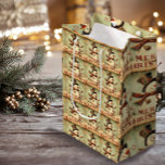 Vintage Snowman - Merry Christmas medium gift bag<br><div class="desc">The Vintage Snowman - Merry Christmas medium gift bag is the perfect way to add a touch of nostalgia to your holiday gifting. Featuring a charming vintage-inspired snowman design, this gift bag exudes timeless holiday cheer. The medium size is ideal for presenting medium-sized gifts, making it versatile for various occasions....</div>
