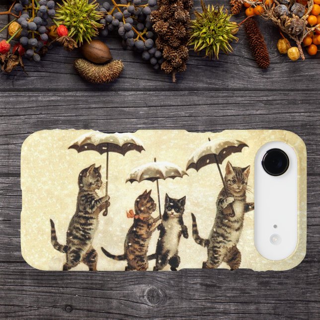 Vintage Striped Cats Umbrellas Dancing Snow (Four brown cats walking upright with umbrellas in snow on light yellow phone case.)