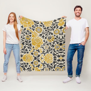 Vintage-style yellow and black floral pattern fleece blanket
