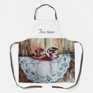 Vintage tea cups on white lace linen  apron