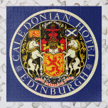 Vintage Travel Caledonian Hotel Edinburgh Scotland Jigsaw Puzzle<br><div class="desc">Vintage illustration European travel poster or luggage label from the Caledonian Hotel, Edinburgh, Scotland featuring the royal coat of arms of Scotland. A circle design with a red lion symbolizing the King of Scots, on top of the shield is the helm and crest. The lion wears the Crown of Scotland...</div>