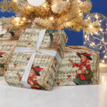 Vintage What Child Is This Christmas Carol Script  Wrapping Paper<br><div class="desc">Vintage ephemera cute little girl with lovely holly wreath and Christmas gifts on "What Child Is This Christmas" Carol script print wrapping paper. Your present will look extra jolly under the tree. Ideal for vintage lovers.</div>
