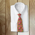 Vintage Word Collage 1970s Style Christmas Pattern Tie<br><div class="desc">Add a vintage touch to your Christmas look this year with this retro style necktie. It features a collage of Christmas greetings and sayings in a seventies style colour palette of pink,  orange,  red,  green and lime green. The reverse side has a coordinating geometric print.</div>