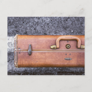 Vintage, Worn Suitcase on Side of Road Postcard