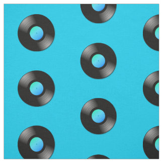 Vinyl LP Record on Blue Pattern Fabric