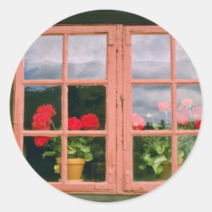 Violet Geraniums In The Window Of A Traditional Ho Classic Round Sticker