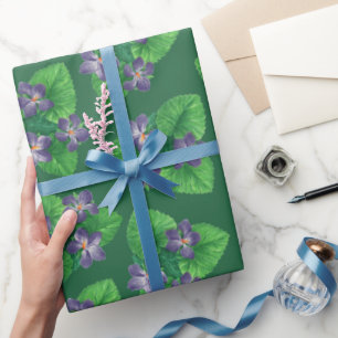 Violets on emerald green wrapping paper