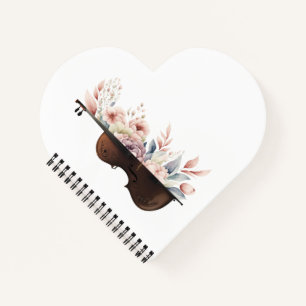 Violin among flowers. Bouquet of flowers. Notebook