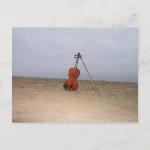 Violin on beach postcard