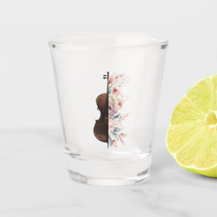 Violin with flowers. shot glass