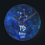 Virgo Zodiac Constellation Blue Galaxy Monogram Round Clock<br><div class="desc">Virgo Zodiac Constellation Blue Galaxy Monogram Design With trendy Brushed Script Font, Dark blue celestial watercolor background texture, Glowing star constellation, and The Maiden symbol. Modern Astrological Sign Birth Horoscope, is perfect for any Virgo Birthday From August 23 - September 22 ! With Optional Monogrammed First Middle and Last name...</div>