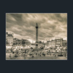 Visitors in Trafalgar Square, London Postcard<br><div class="desc">Trafalgar Square is a public space and tourist attraction in central London, with Nelson's Column at its centre which is guarded by four lion statues at its base. It's a beautiful part of the city with museums and galleries surrounding it and the Mall leading up to Buckingham Palace on one...</div>
