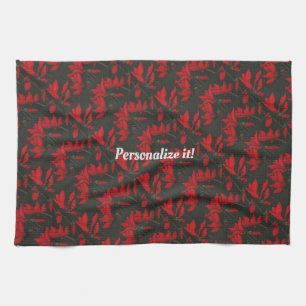 Vivid red Cyclamen on a dark black background Tea Towel