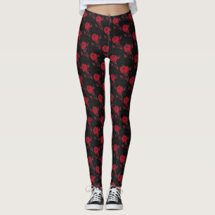 Vivid Red woodcut tiled rose on a black background Leggings