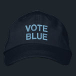 Vote Blue bold text political Embroidered Hat<br><div class="desc">Spread the message to vote for liberal democrats in political elections with a "VOTE BLUE" baseball hat featuring bold blue text on a navy blue background. You can choose other colours and styles of hats in the sidebar. To see the design Vote Blue on other items, click the "Rocklawn Arts"...</div>