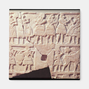 Votive plaque depicting an offering scene magnet