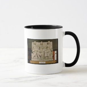 Votive sculpture of a triple mother deity mug