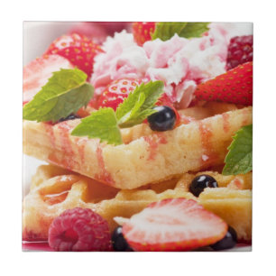 Waffle cake with fresh berry fruit tile