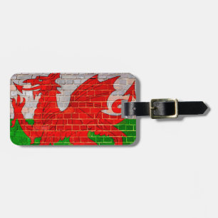 Wales flag on a brick wall luggage tag