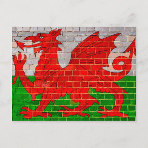 Wales flag on a brick wall postcard