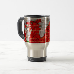 Wales flag on a brick wall travel mug