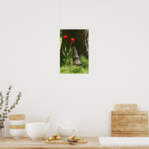 Wall print with red tulips on the tree trunk