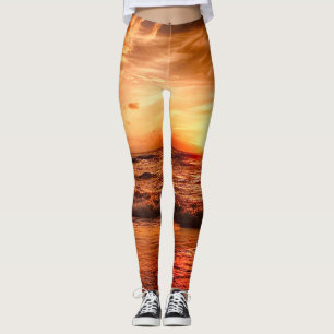 Warm Golden Orange Sunset Over Ocean  Leggings