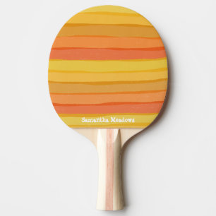 Warm orange and yellow stripey ping pong paddle