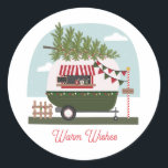 Warm Wishes Hot Cocoa Camper Christmas Classic Round Sticker<br><div class="desc">Snow scene with illustration of a camper decorated for Christmas with a fresh cut tree on top,  red and white candy cane striped awning,  red and green bunting,  Christmas lights,  and north pole.  Camper is selling hot chocolate,  or hot cocoa with candy canes,  marshmallows,  and gingerbread man.</div>