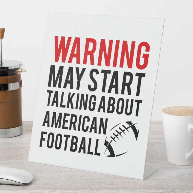 Warning May Start Talking About American Football Pedestal Sign (In SItu)