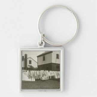 Washing line outside houses key ring