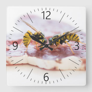 Wasps eating a sausage square wall clock