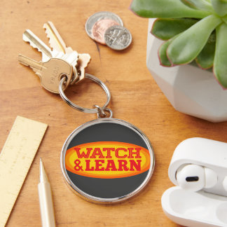 Watch & Learn Radial Oval Key Ring