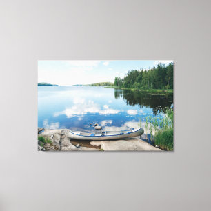 Water   Canoe on Lake in Sweden Canvas Print