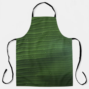 Water droplets on green leaf apron