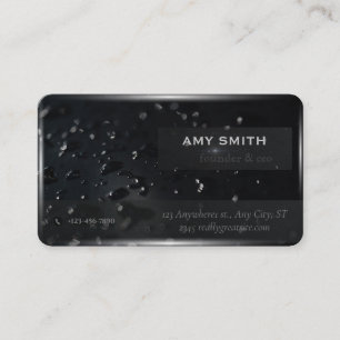 Water droplets on the background of black space business card