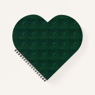 Water Drops on Green Metal Notebook