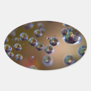 Water in Motion Oval Sticker