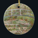 Water Lilies ~ Monet Ceramic Tree Decoration<br><div class="desc">Bridge Over Pond With Water Lilies by Claude Monet. Impressionist floral masterpiece painting of bridge arching over pond laden with white, pink and yellow tinged water lilies and perhaps other aquatic flowers painted by Claude Monet as part of a series of twelve paintings featuring this water lilies motif. This famous...</div>