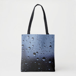 Water on mirror close-up photography tote bag