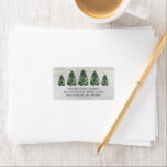 Watercolor Christmas Tree Farm Grey Return Address Label<br><div class="desc">Festive custom holiday address label design features a rustic chic winter scene from a Christmas tree farm and a snowy grey winter background. Includes a row of green watercolor painted pine trees with string lights. Personalise the simple charcoal grey wording with your family's return address text. Makes a beautiful accent...</div>